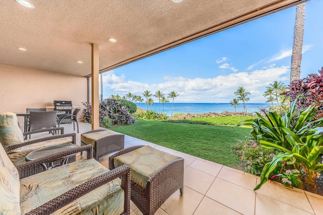 view of patio / terrace featuring a water view