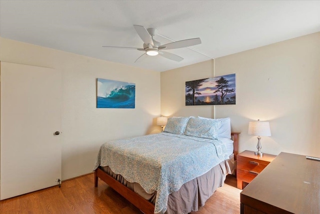 bedroom featuring wood-type flooring and ceiling fan