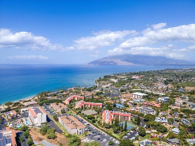 aerial view featuring a water and mountain view