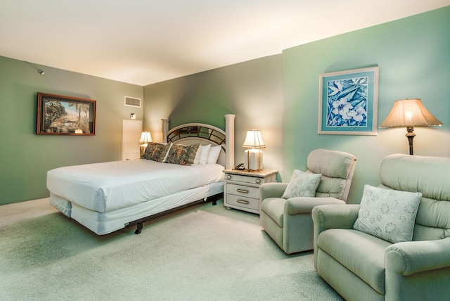 bedroom with light colored carpet