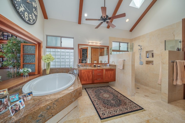 bathroom featuring a wealth of natural light, beamed ceiling, independent shower and bath, and ceiling fan