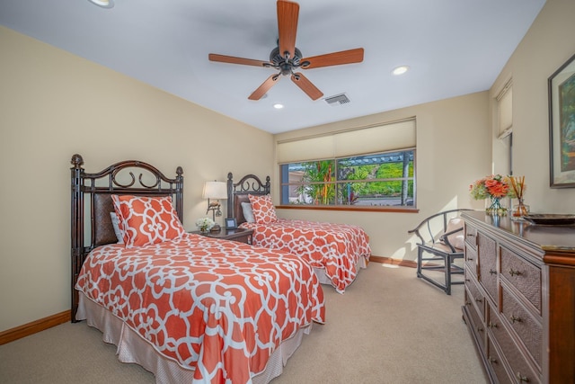 carpeted bedroom with ceiling fan