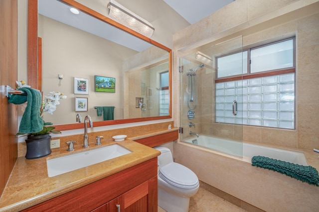 full bathroom featuring vanity, toilet, and enclosed tub / shower combo