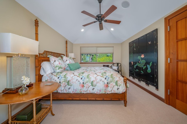 bedroom with carpet flooring, ceiling fan, and vaulted ceiling