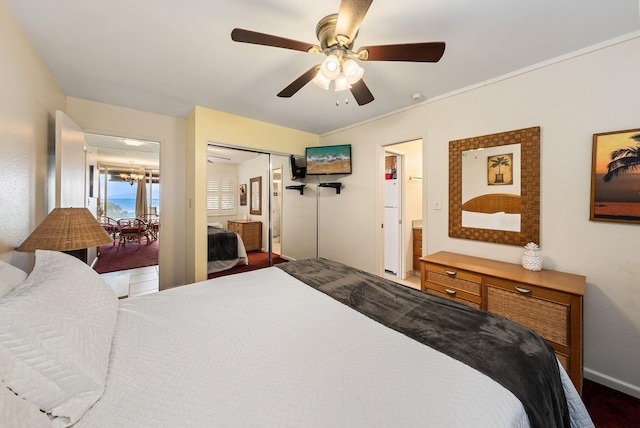 bedroom featuring dark hardwood / wood-style flooring, a closet, and ceiling fan