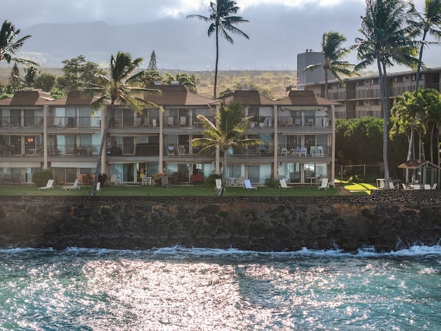 view of property's community with a water view