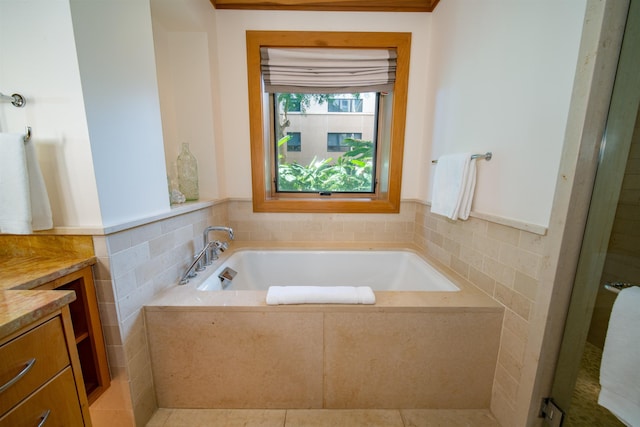 1 Bay Dr Unit 1204, Lahaina, HI 96761 - full bathroom featuring a garden tub, vanity, and tile walls