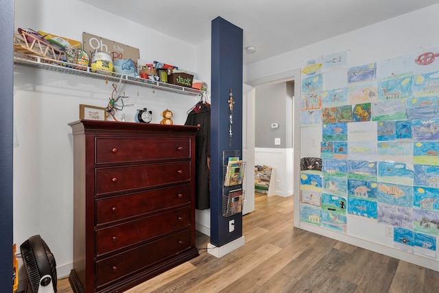 bedroom with light hardwood / wood-style flooring