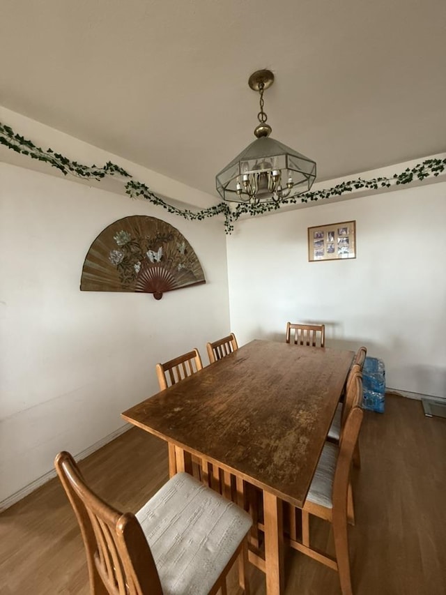 dining area featuring hardwood / wood-style floors