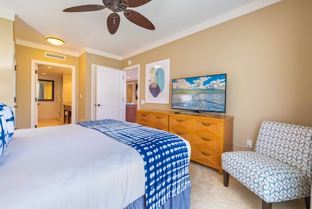 bedroom with ceiling fan, connected bathroom, ornamental molding, and light tile patterned floors