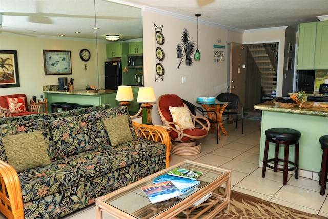 tiled living room with ornamental molding