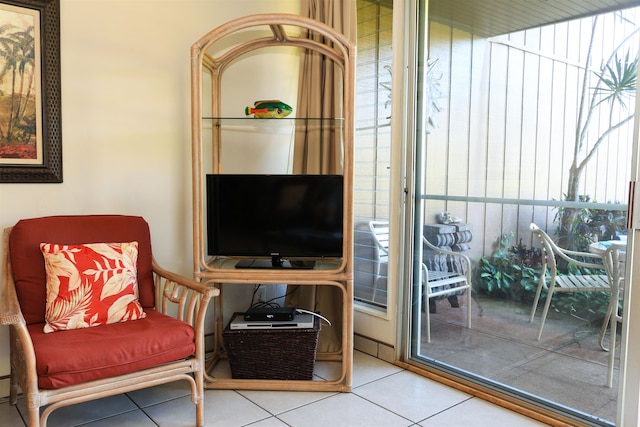 sitting room featuring light tile patterned floors