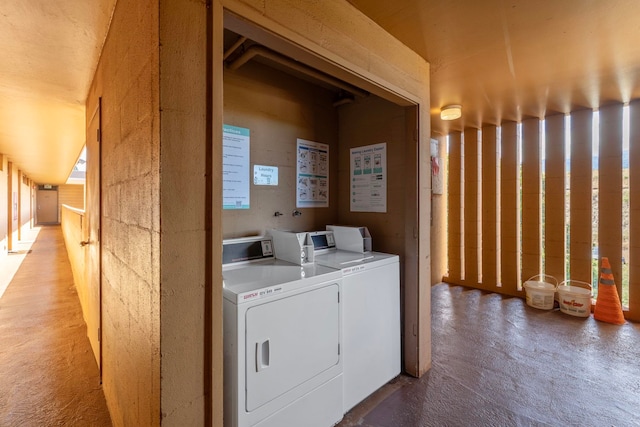 washroom with washer and clothes dryer