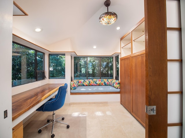 tiled office featuring built in desk and vaulted ceiling