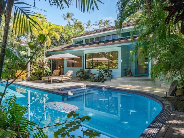 view of pool featuring a patio