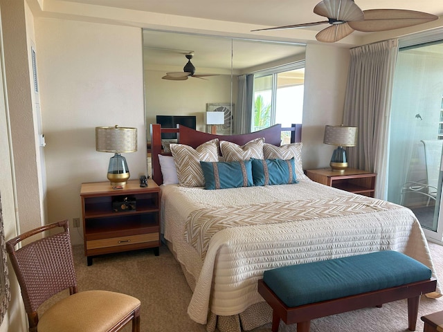 bedroom featuring ceiling fan and carpet flooring