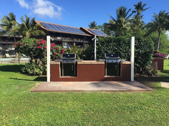 view of patio featuring a grill and exterior kitchen