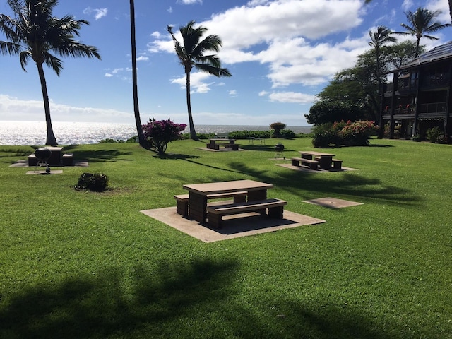 view of home's community featuring a lawn