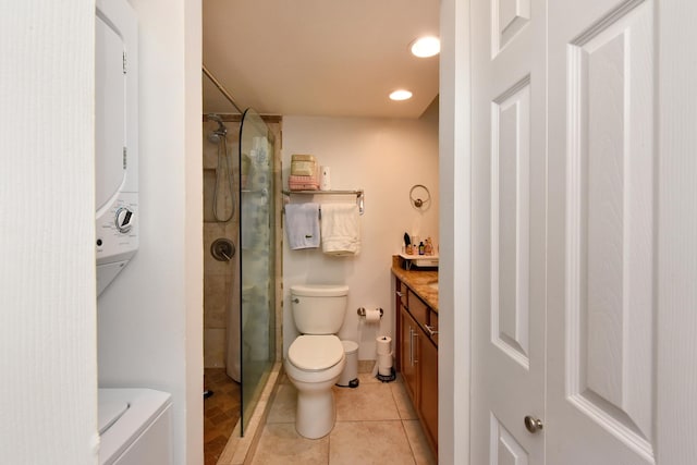 bathroom featuring vanity, tile patterned floors, toilet, and curtained shower