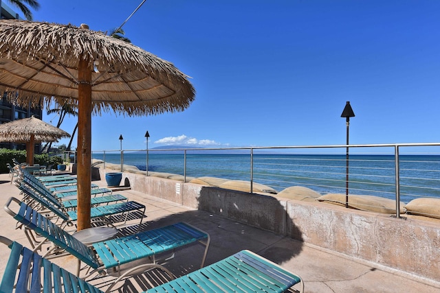 view of patio / terrace with a water view