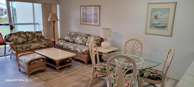 living room with light hardwood / wood-style flooring