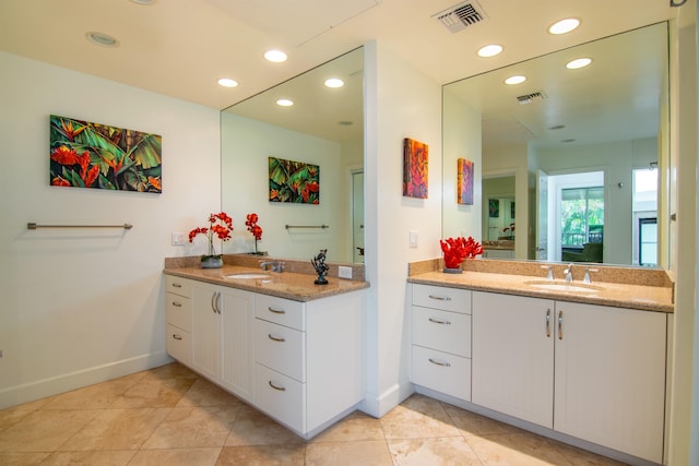 bathroom with vanity and tile patterned floors