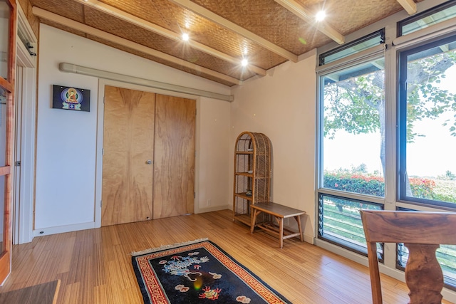 1195 Omaopio Rd Unit A, Kula, HI 96790 - sitting room featuring wood finished floors, healthy amount of natural light, and beamed ceiling