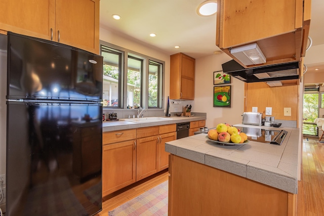 1195 Omaopio Rd Unit A, Kula, HI 96790 - kitchen with freestanding refrigerator, light wood-style floors, tile countertops, recessed lighting, and cooktop