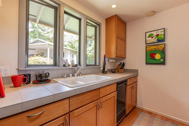 1195 Omaopio Rd Unit A, Kula, HI 96790 - kitchen with dishwasher, healthy amount of natural light, light wood-style flooring, tile counters, and recessed lighting
