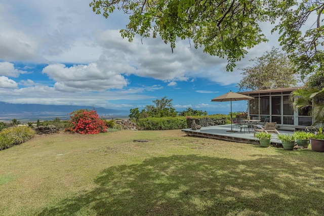 1195 Omaopio Rd Unit A, Kula, HI 96790 - view of grassy yard with a sunroom and a deck