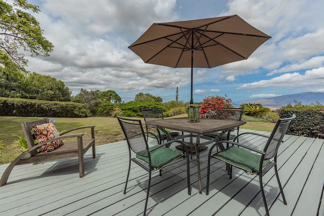 1195 Omaopio Rd Unit A, Kula, HI 96790 - wooden terrace with outdoor dining area and a yard