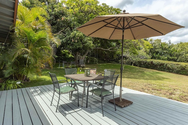 1195 Omaopio Rd Unit A, Kula, HI 96790 - wooden deck featuring outdoor dining space, a yard, and view of wooded area