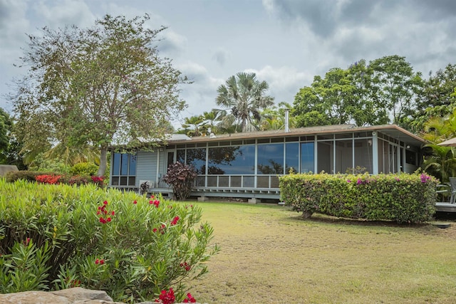 1195 Omaopio Rd Unit A, Kula, HI 96790 - rear view of property with a sunroom and a yard