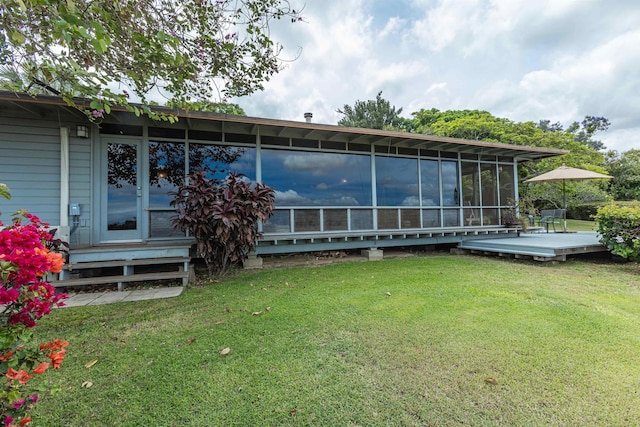 1195 Omaopio Rd Unit A, Kula, HI 96790 - back of property featuring a sunroom, a deck, and a lawn