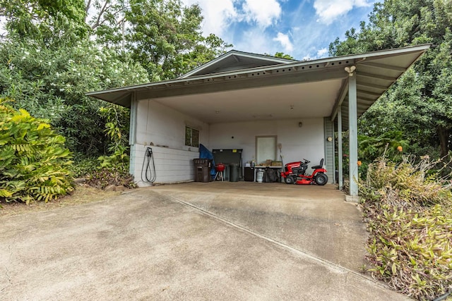 1195 Omaopio Rd Unit A, Kula, HI 96790 - view of vehicle parking featuring an attached carport and concrete driveway