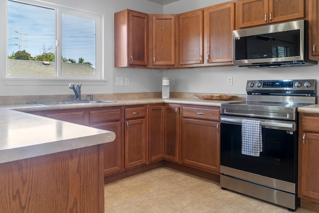 kitchen with stainless steel appliances and sink