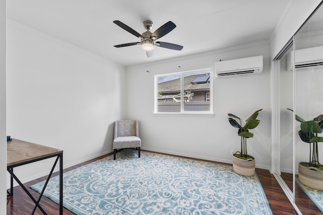 living area featuring ceiling fan, ornamental molding, a wall unit AC, and hardwood / wood-style floors