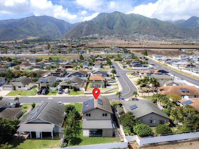 birds eye view of property featuring a mountain view