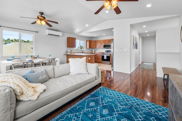 living room with lofted ceiling, a wall mounted AC, dark hardwood / wood-style floors, and ceiling fan