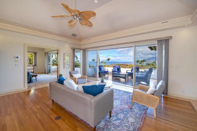 living room featuring light hardwood / wood-style floors and ceiling fan