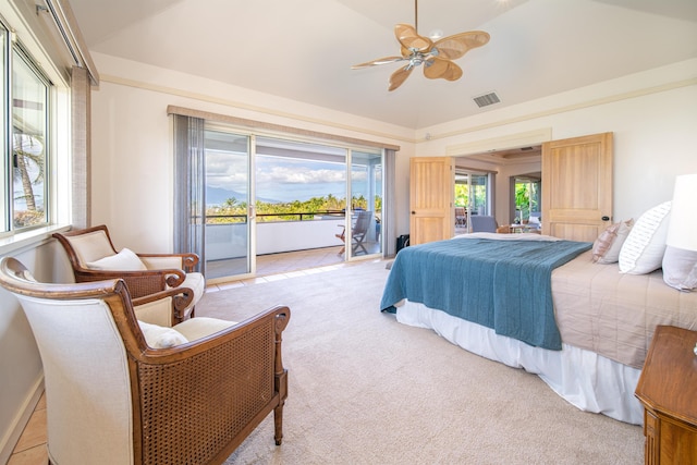 carpeted bedroom with multiple windows, access to exterior, ceiling fan, and vaulted ceiling