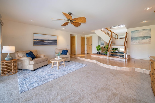 living room with ceiling fan and light carpet