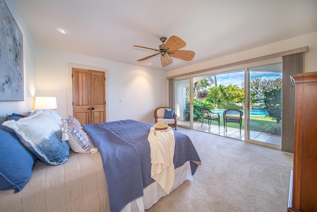 carpeted bedroom featuring ceiling fan and access to exterior