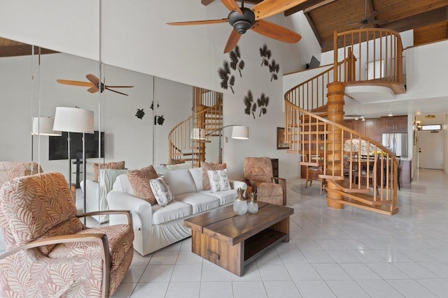 living room featuring wood ceiling, high vaulted ceiling, light tile patterned floors, beamed ceiling, and ceiling fan