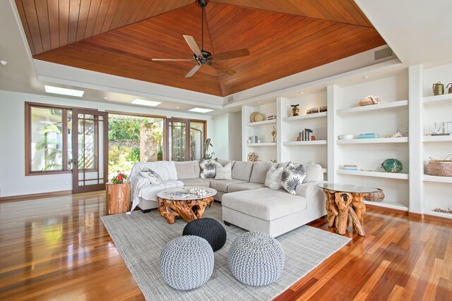 living room with wood-type flooring, french doors, wood ceiling, and ceiling fan