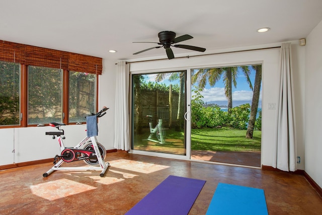 workout area with a ceiling fan, recessed lighting, and baseboards