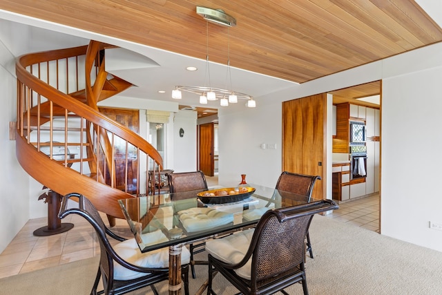 tiled dining area with wood ceiling