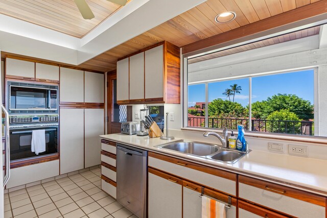 4000 Wailea Alanui Dr Unit 1904, Kihei, HI 96753 - kitchen featuring a sink, black appliances, wooden ceiling, light countertops, and light tile patterned floors
