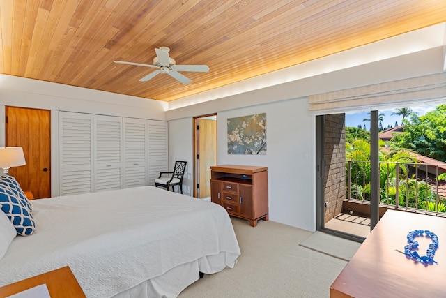 bedroom with a closet, access to outside, light carpet, wooden ceiling, and ceiling fan