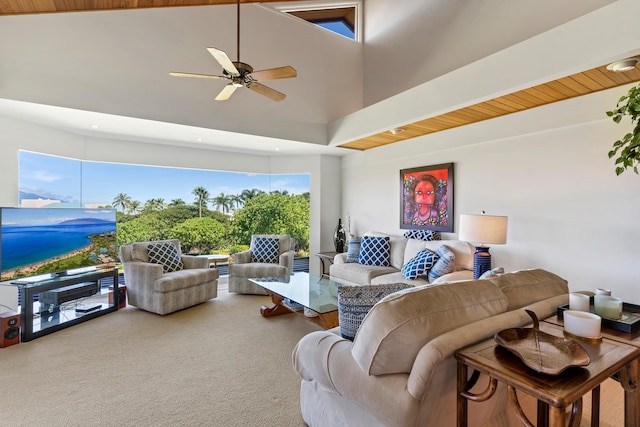 living room with wood ceiling, ceiling fan, high vaulted ceiling, carpet floors, and beamed ceiling